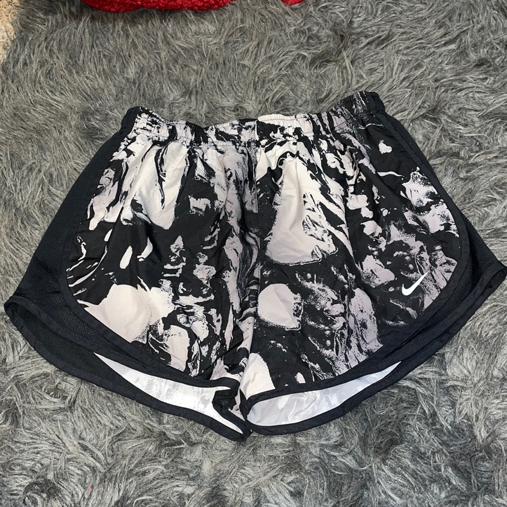 Women's Nike dri-fit running shorts with build in underwear, sz M